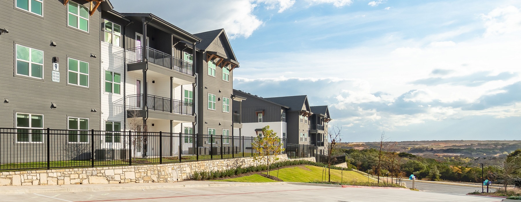Apartment complex with hill country views